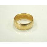 NINE CARAT GOLD WEDDING BAND ring size T and approximately 7.