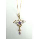 AMETHYST AND DIAMOND HOLBEIN PENDANT in unmarked gold and on ten carat gold chain