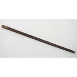 WWII 'ROYAL ARMY SERVICE CORPS' SWAGGER STICK with a tapering stained oak shaft with brass caps, 70.