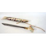 BORNEO MANDAU HEAD HUNTERS SWORD with a 45.