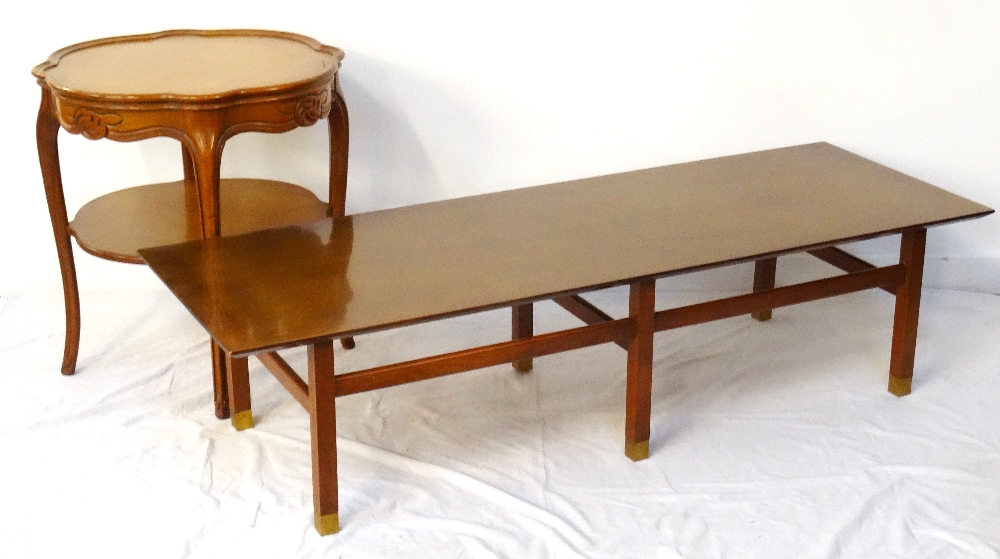 MAHOGANY OBLONG OCCASIONAL TABLE standing on six squared supports with brass caps,