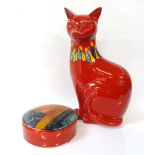 POOLE POTTERY CAT seated with a red body glaze and blue and yellow collar, 29.