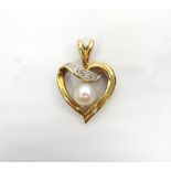 PRETTY PEARL AND DIAMOND HEART SHAPED PENDANT in nine carat gold