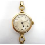 1930's LADYIES 'ROLEX' NINE CARAT GOLD CASED WRISTWATCH with black Arabic numerals on silvered dial,