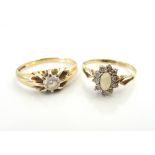 TWO GEM SET GOLD RINGS one an opal and clear gem set cluster ring in unmarked gold,