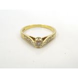 DIAMOND SOLITAIRE RING on eighteen carat gold shank,