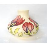 MOORCROFT POTTERY SQUAT VASE decorated in the magnolia pattern on a cream ground,