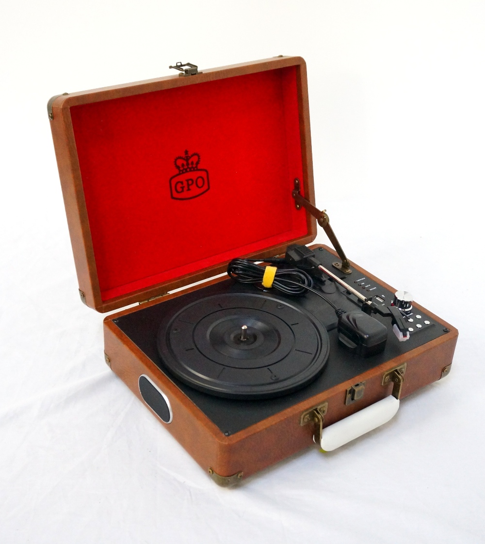 'GPO' PORTABLE CASED RECORD PLAYER in brown leatherette case with integrated speakers