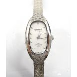 LADIES INGERSOLL DECADENCE WRISTWATCH with crystals above and below the dial,