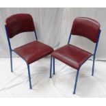 SET OF SEVEN METAL FRAMED STACKING CHAIRS with padded backs and seats,