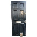 FRONT DOOR TO SPUD'S FLAT the panelled door with letter box and operational lock (with key),
