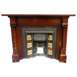LARGE PERIOD MAHOGANY FIRE SURROUND with moulded top and pillar decorated supports flanking the