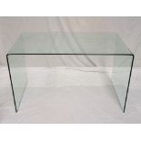 DESIGNER GLASS TABLE 74cm high x 136cm wide (From the burglary house)