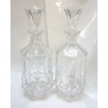 PAIR OF CRYSTAL GLASS DECANTERS with stoppers, of shaped form, 29.