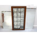 SELECTION OF FOUR VARIOUS MIRRORS together with a oak framed window panel with fifteen leaded panes
