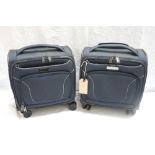 PAIR OF RENTON'S BLUE TRAVELLING CASES with wheels (From Renton's Bedroom)