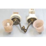 PAIR OF SHAPED BRASS WALL LIGHTS each with two shaped arms and mottled pink glass shades (each