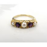 AMETHYST AND PEARL RING on nine carat gold shank,