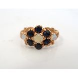 UNUSUAL SAPPHIRE AND OPAL CLUSTER RING on nine carat rose gold shank,