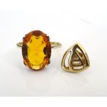 CAIRNGORM SINGLE STONE DRESS RING on nine carat gold shank,