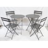 TWO METAL FOLDING TABLES each with a circular top, 60cm diameter,