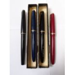 THREE PARKER 'SLIMFOLD' FOUNTAIN PENS with 14K gold nibs, two with boxes,