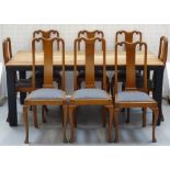 OBLONG WALNUT PLANK TOP DINING TABLE with a stained frieze, standing on square supports,