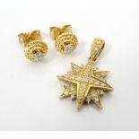 PAIR OF DIAMOND STUD EARRINGS in stepped eighteen carat gold mounts,