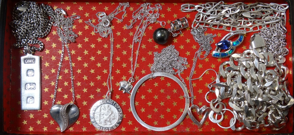 SELECTION OF SILVER PENDANTS AND NECK CHAINS including an ingot style pendant,