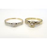 TWO DIAMOND SOLITAIRE RINGS both on nine carat gold shanks,