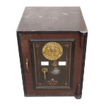 MILNERS PATENT SAFE the panelled door with a circular gilt metal plaque,