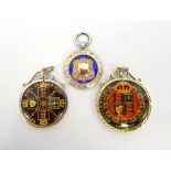 VICTORIA ENAMELLED HALFCROWN dated 1887, and an enamelled florin 1889,