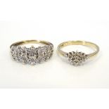 TWO DIAMOND CLUSTER RINGS one a diamond shaped cluster ring, the diamonds totalling approximately 0.