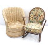 ERCOL STYLE ROCKING CHAIR with a hoop stick back above outswept arms,