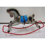1960's CHILD'S MOULDED PLASTIC ROCKING HORSE with leather harness and straps,