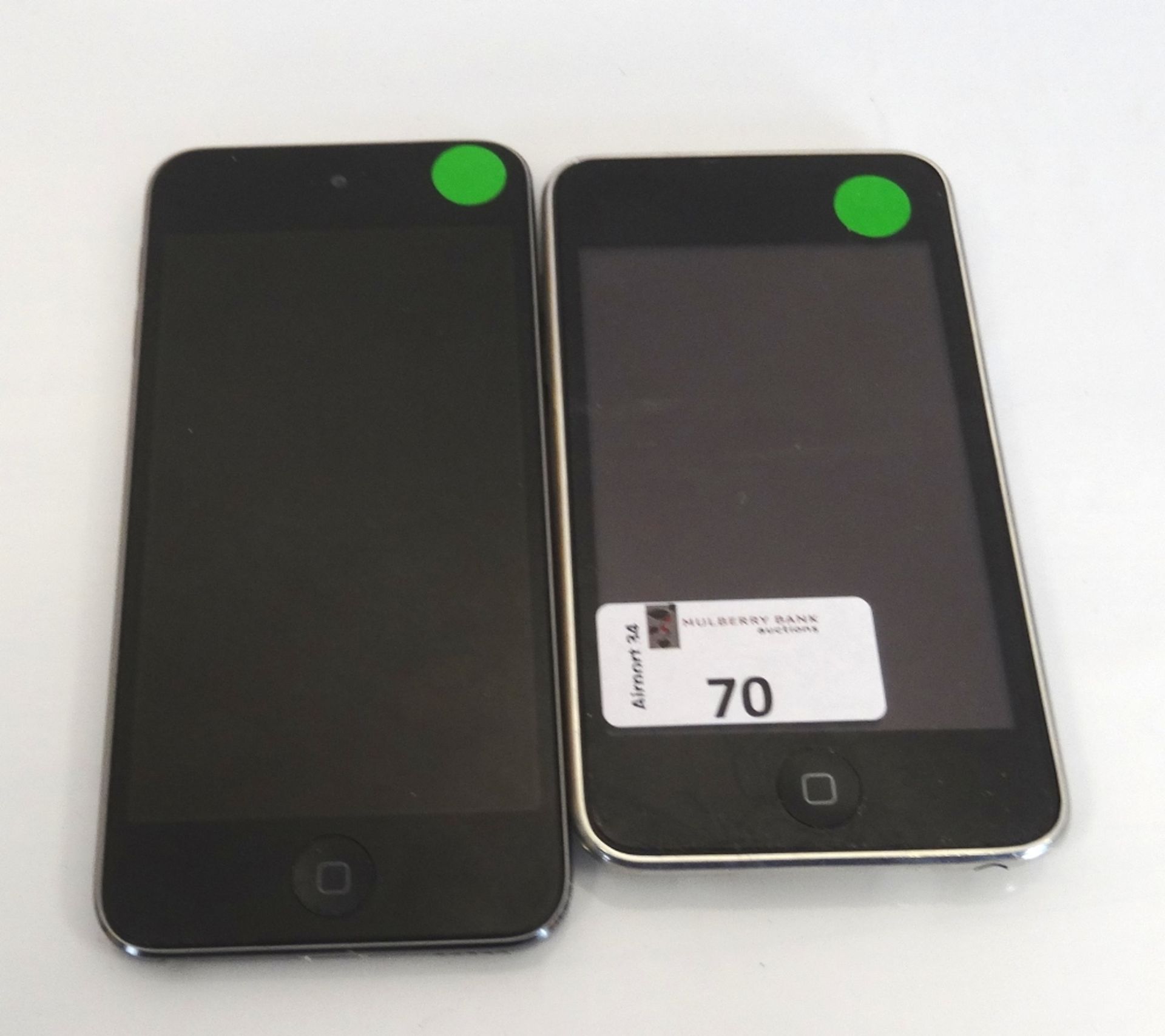 TWO APPLE IPOD TOUCH DEVICES