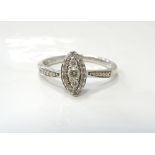 DIAMOND CLUSTER DRESS RING the diamonds totalling approximately 0.