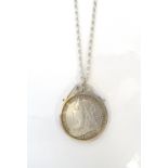 VICTORIAN SILVER CROWN PENDANT on silver chain,