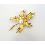 NINE CARAT GOLD LEAF DESIGN BROOCH with central cultured pearl to the centre