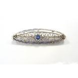 EDWARDIAN SAPPHIRE SET BROOCH in fourteen carat gold,