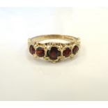 GRADUATED GARNET FIVE STONE RING