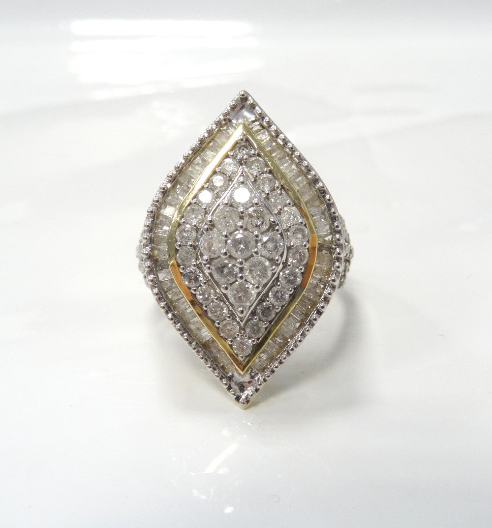 MULTI DIAMOND SET RING the multi diamonds in marquise shaped setting with further diamonds to the