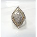 MULTI DIAMOND SET RING the multi diamonds in marquise shaped setting with further diamonds to the