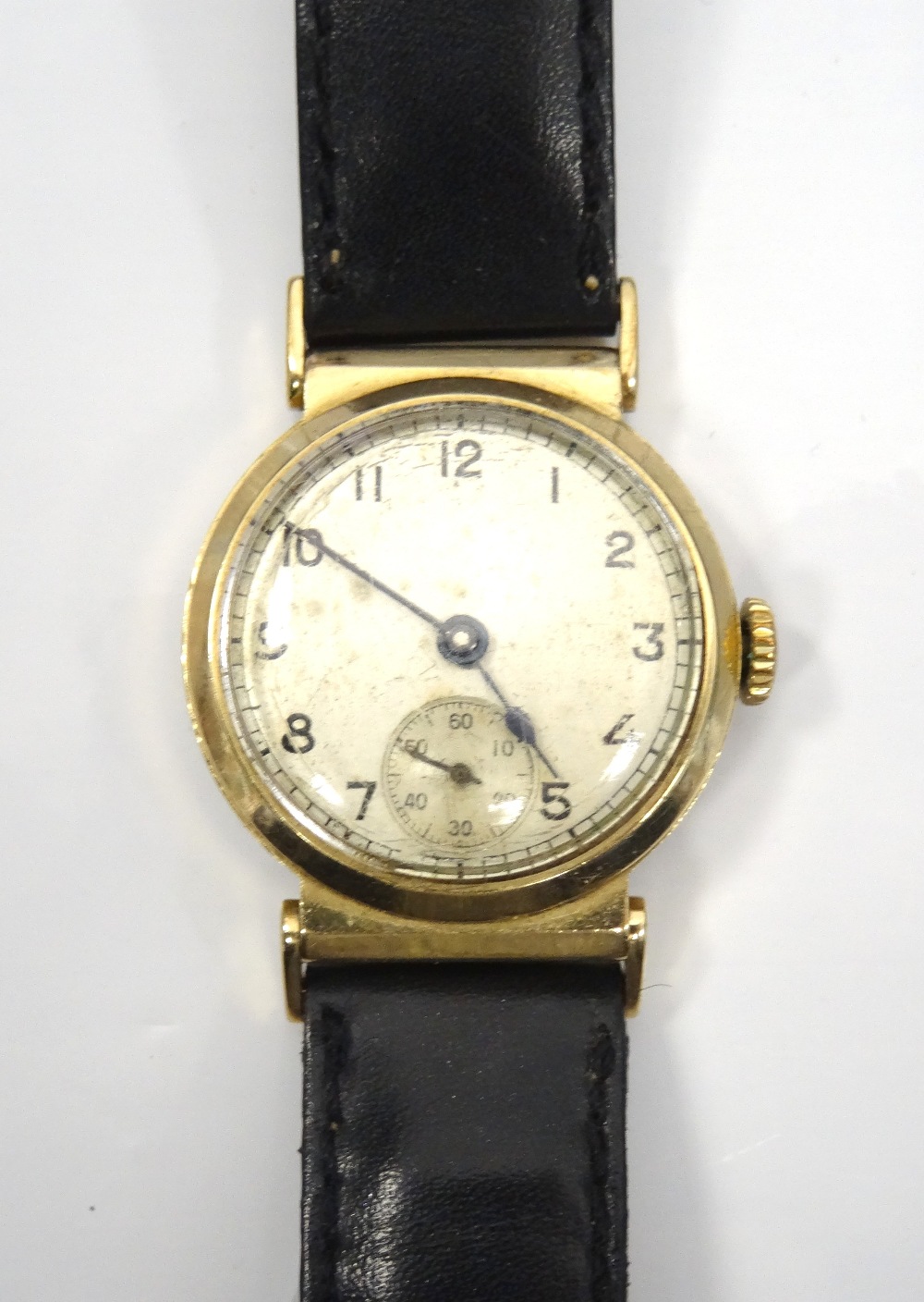 GENTLEMAN'S 1940's NINE CARAT GOLD CASED WRISTWATCH the dial with Arabic numerals and subsidiary