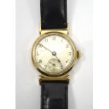 GENTLEMAN'S 1940's NINE CARAT GOLD CASED WRISTWATCH the dial with Arabic numerals and subsidiary