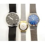 THREE 'SKAGEN' (DENMARK) WRISTWATCHES two gentlemen's examples numbered to the backplate '233LSTN'