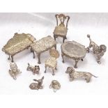 SMALL COLLECTION OF WHITE METAL DOLL'S FURNITURE with embossed decoration,