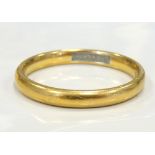 TWENTY-TWO CARAT GOLD WEDDING BAND ring size M-N and approximately 3.