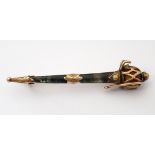 SCOTTISH UNMARKED GOLD AND HARD STONE BROOCH modelled as a basket hilt sword,