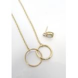 NINE CARAT GOLD NECKLACE with interlocking hoop pendant section, approximately 3.